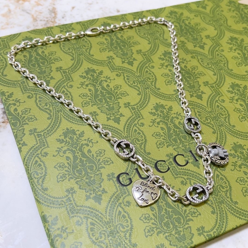 G*u*i necklaces